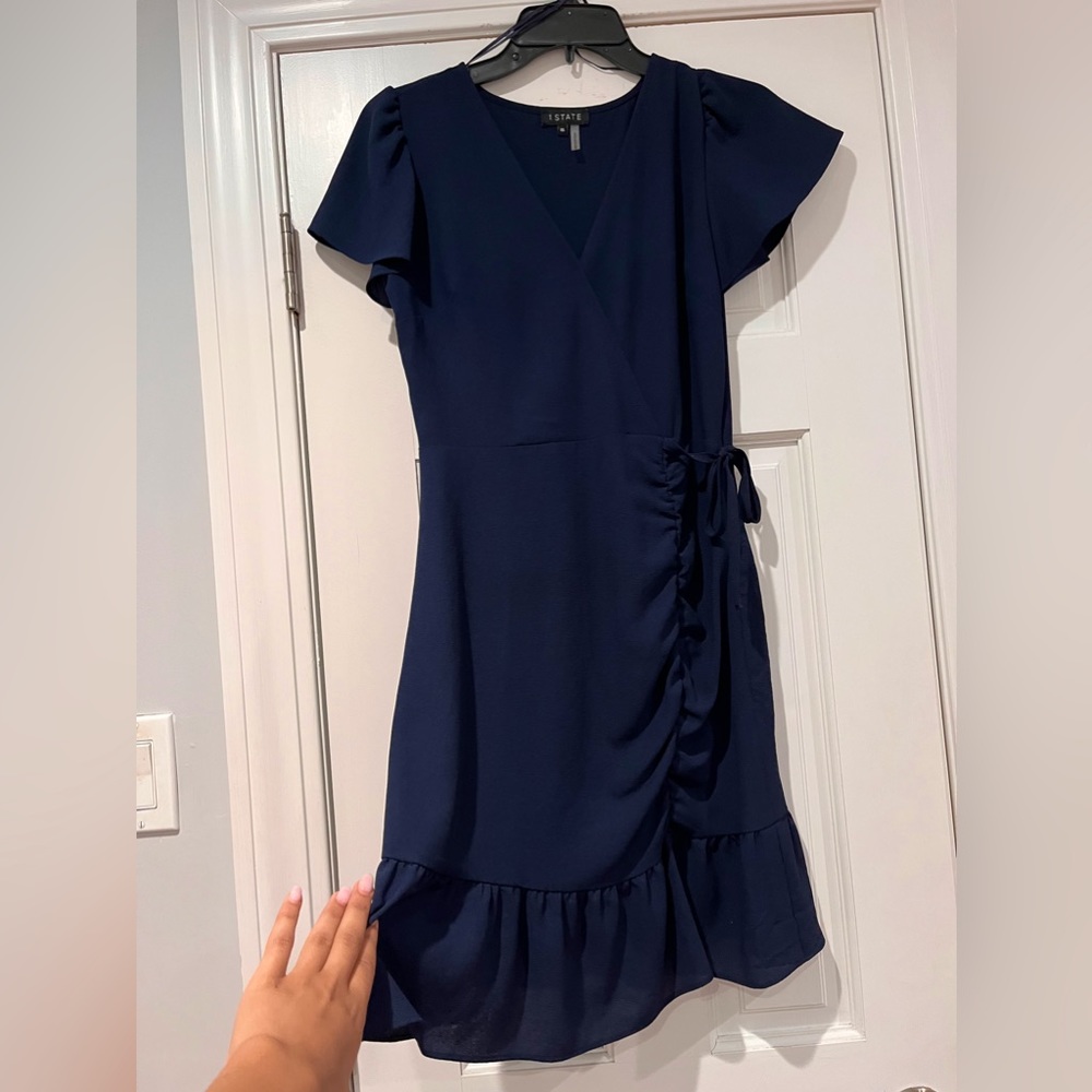 Comfortable navy blue shirt sleeve dress. Can be dressed down or up!